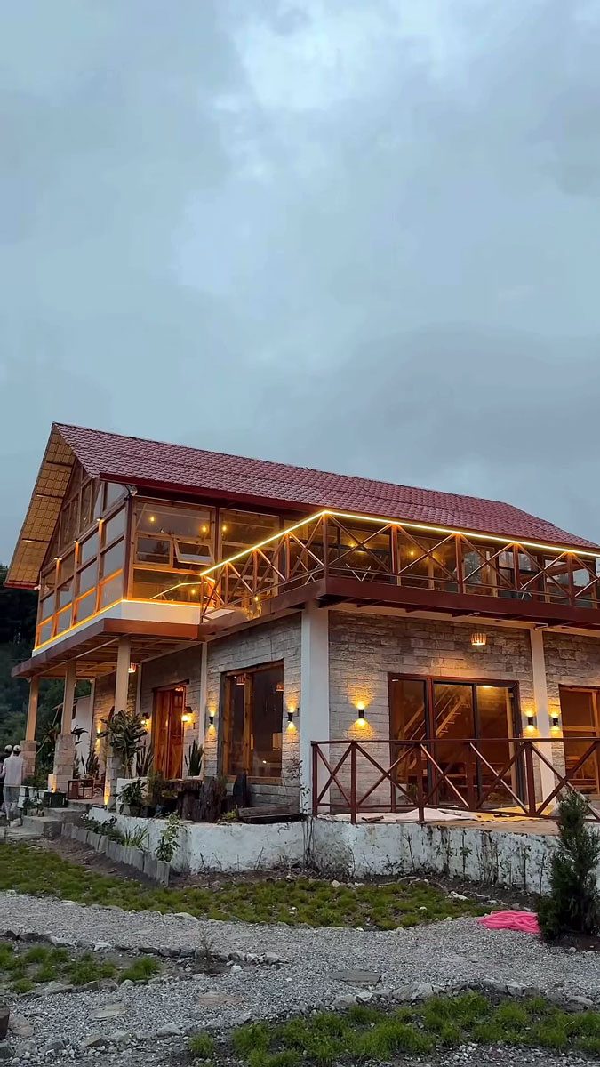 The main building lit up at dusk